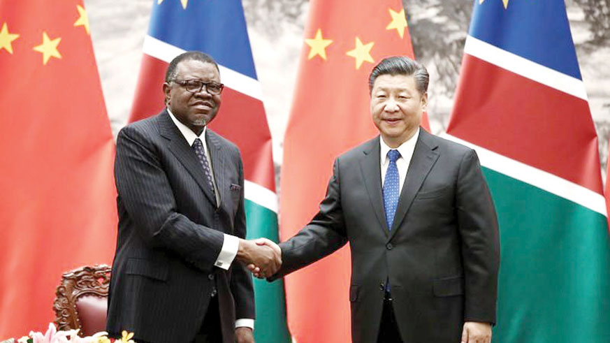 Chinese President Xi Jinping (R) shakes hands with Namibiau2019s President Hage G. Geingob after a signing ceremony at The Great Hall Of The People on March 29, 2018 in Beijing. Net photo.