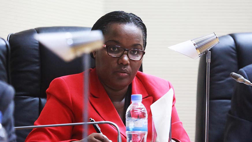 Minister for Agriculture and Animal Resources Dr Geraldine Mukeshimana listens to the clarifications of MPs during the session