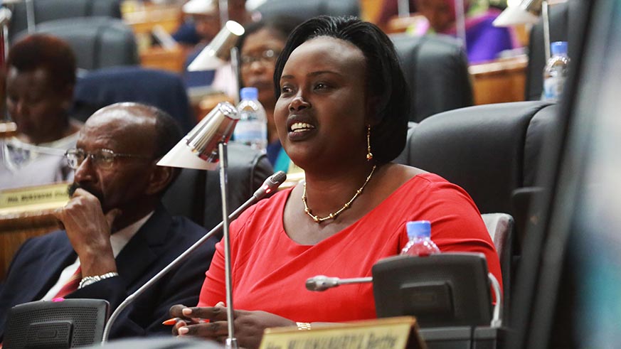 MP Christine Muhongayire asks some clarifications during the session after the presentation