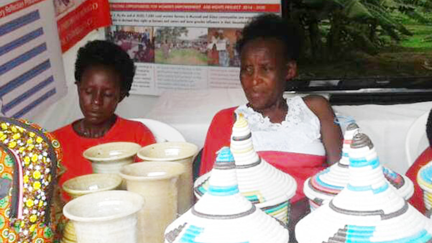 Some of the women showcase the items they make. /Courtesy photo Circled: Clementine Mukangemanyi, the group leader. 