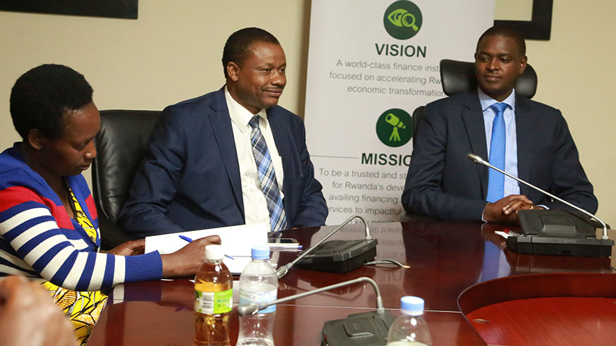 Rutabana (right) and some of the SACCO leaders at the signing ceremony in Kigali yesterday. / Sam Ngendahimana.