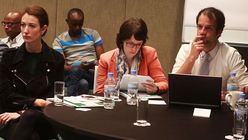 Participants follow the presentation of the report launched at Kigali yesterday (Sam Ngendahimana)