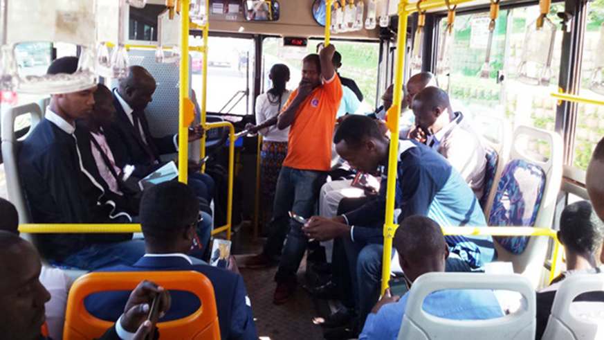 Passengers using internet in buses. All photos by Joseph Mudingu.