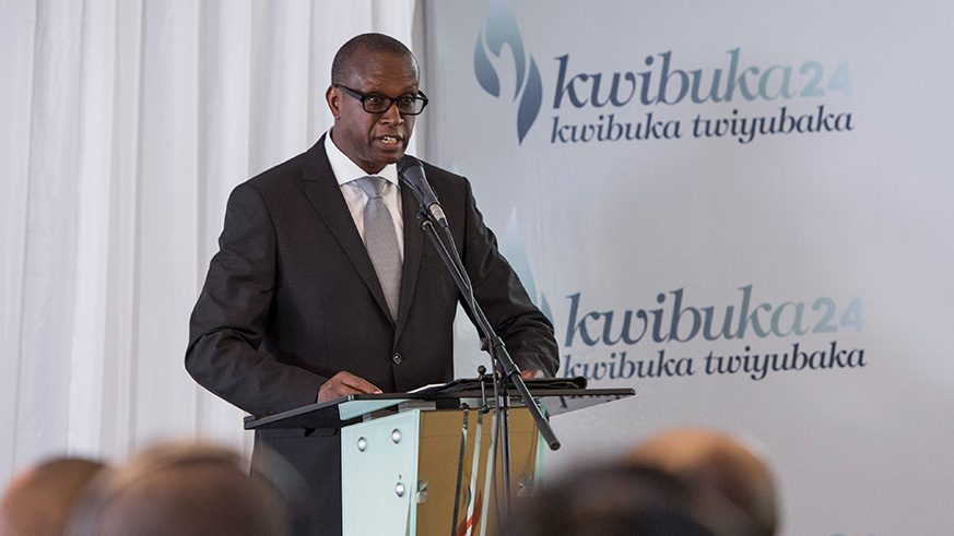 Dr Jean DamascÃ¨ne Bizimana, Executive Secretary of the National Commission for the fight against Genocide (CNLG) speaks during the commemoration of the 1994 Genocide against the Tutsi at Kigali memorial centre in Gisozi. Village Urugwiro.