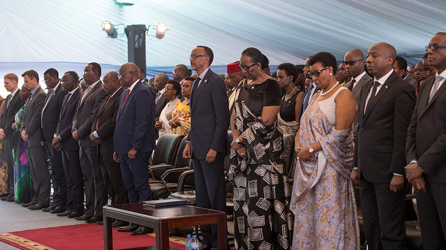 President Kagame, First Lady Jeannette Kagame, Speaker of Parliament Donatille Mukabalisa (Adjacent to the First Lady), Prime Minister Ã‰douard Ngirente, Dr Jean DamascÃ¨ne Bizimana, Executive Secretary of the National Commission for the fight against Genocide (CNLG), senior government officials and members of the Diplomatic corps observing a minute of silence during commemoration of the 1994 Genocide against the Tutsi at the Kigali Genocide Memorial in Gisozi.  All photos / Village Urugwiro.