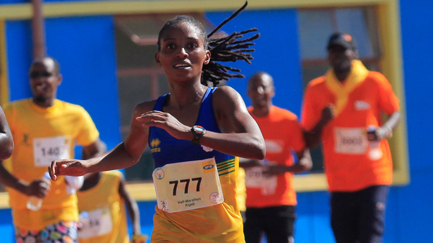 Salome Nyirarukundo crosses the finish-line at the 2017 Kigali International Peace Marathon. (Sam Ngendahimana)