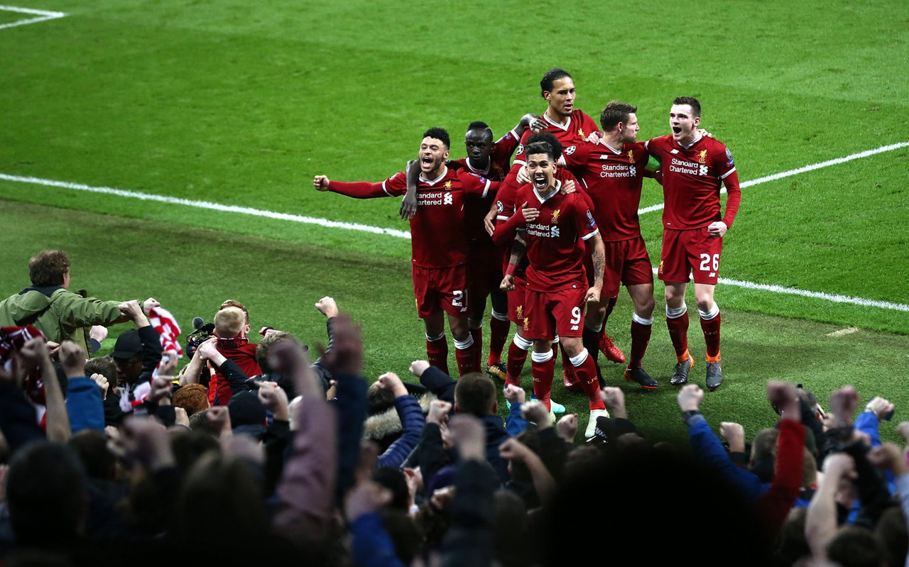 Liverpool players celebrated with fans at the end of the game. Net.