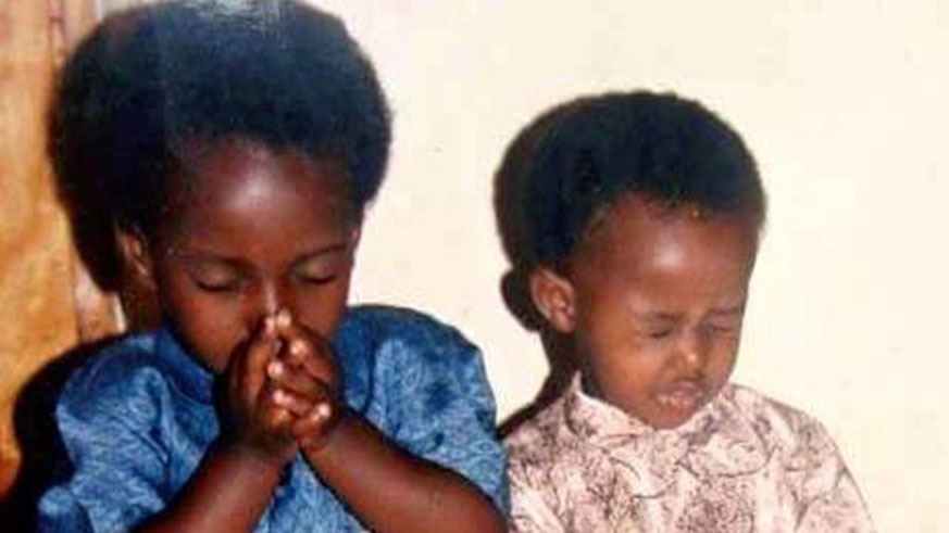 Two Tutsi children pray for a miracle shortly before they were killed, together with their entire  family, by Interahamwe militia. / Net photo