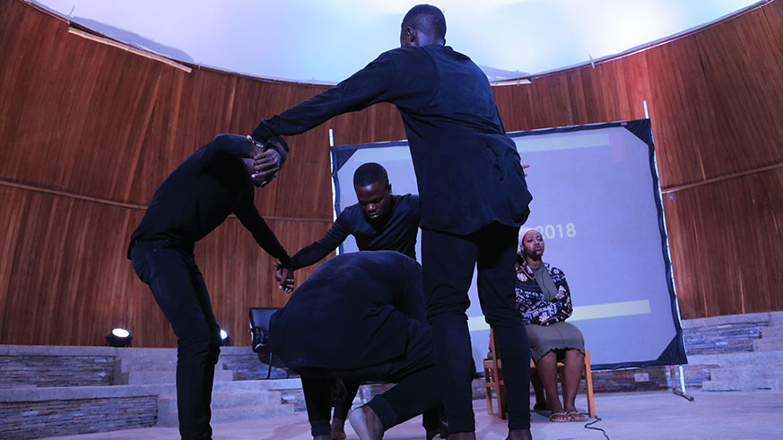 A drama team show  a play to tell a story of unity at the event at Kigali Genocide Memorial on Monday. All photos / Sam Ngendahimana.