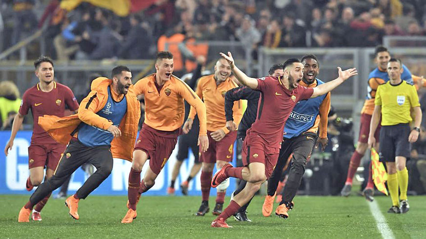 Roma players celebrate an incredible win against Barcelona on Wednesday. New photo