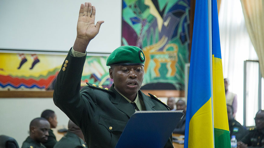 Captain Frederic Kayijuka swears in during judges of the Military High Court