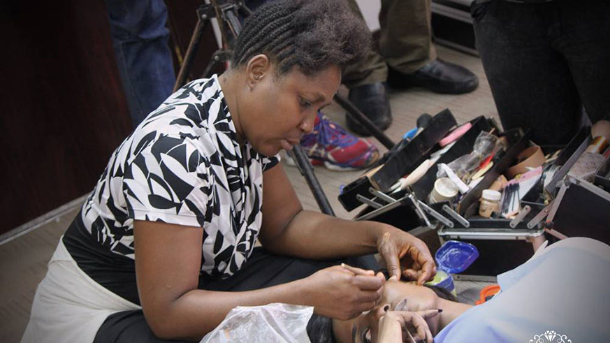 A professional artist applying makeup on set, as the actress getting ready for filming.  /Courtesy.