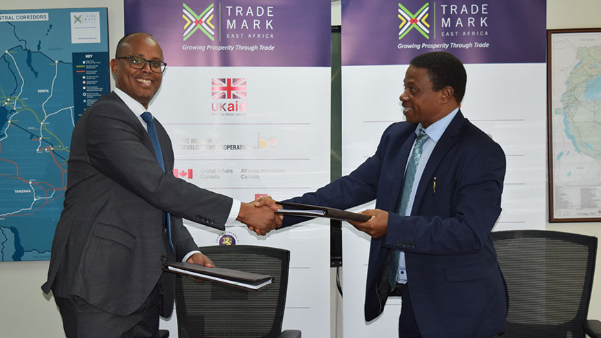 TradeMark Country Director for Kenya, Ahmed Farah (left),   and the acting Executive Secretary of Northern Corridor Transit and Transport Coordination Authority Fred Tumwebaze. File.
