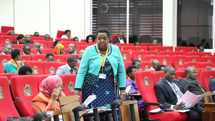 Chairperson of the Committee on Legal Rules and Privileges, Hon. Amb Fatuma Ndangiza presenting the report of the EAC Oaths Bill,2017 (Courtesy)