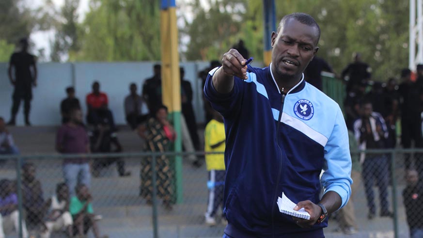 Police coach Innocent Seninga gives instructions to his players during half-time during a previous league game. Police are under pressure after a poor run of results. Sam Ngendahimana.
