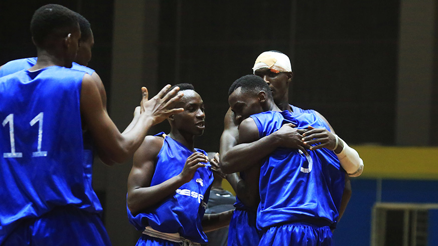 Espoir players celebrate after their crucial victory over  REG in January. They will be hoping for more of the same tomorrow. Sam Ngendahimana.