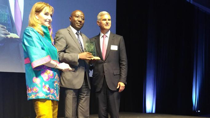 Prime Minister, Edouard Ngirente (C) accepts the Global Tourism Leadership Award in Buenos Aires, Argentina.