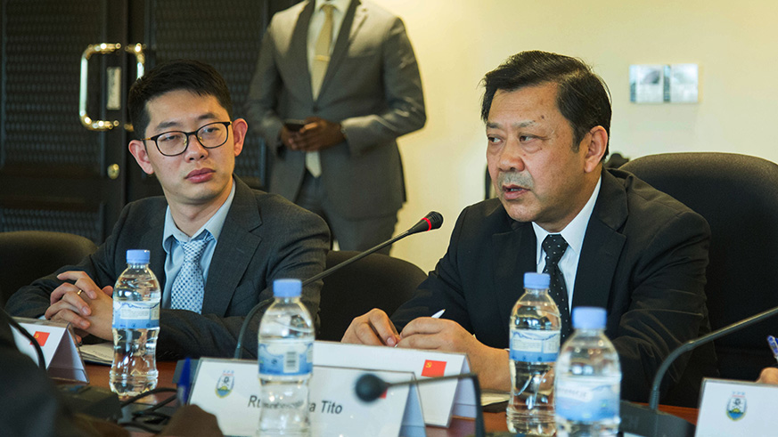 Dr JI Zhiye (R) head of the delegation from China speaks during the meeting with Rwanda Patriotic Front commissioners yesterday at the partyâ€™s headquarter yesterday