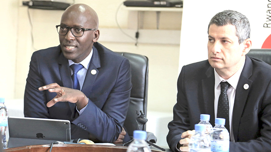 Jean Claude Kalisa, the Managing Director of Energy Utility Corporation Limited (EUCL) gives clarifications during the conference