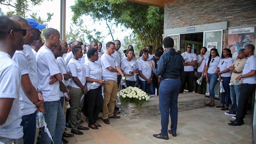 Park Inn staff being briefed before starting the visit at Kigali Genocide Memorial.