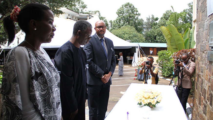 The UN Resident coordinator (center) and Ibuka Vice President Egide Nkuranga, pay tribute to Genocide victims E Mpirwa
