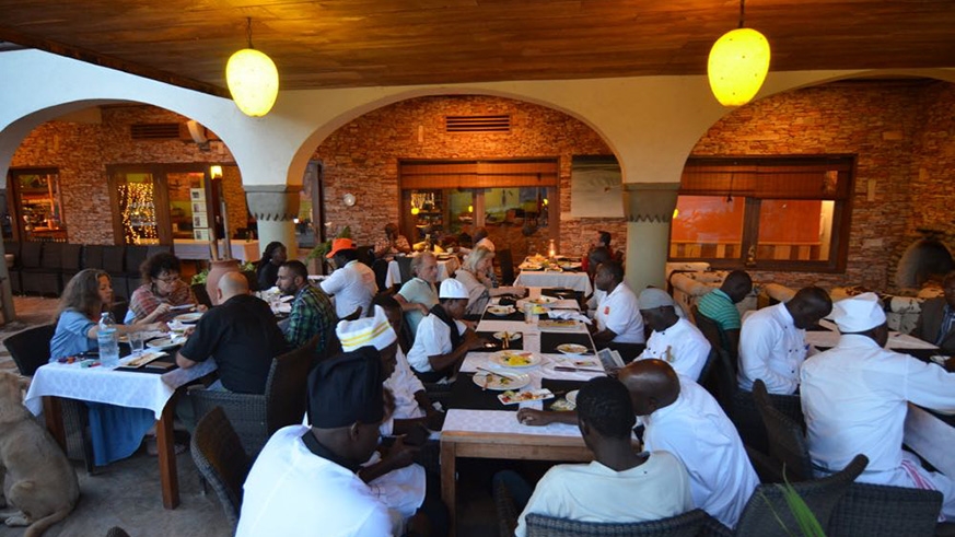 Guests and chefs tasting dishes at last yearu2019s Silverchef competition in Kabale, Uganda.