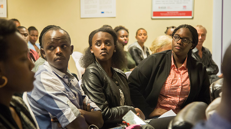 Participants follow proceedings during 100days 100 questions meeting at the Kigali memorial centre in Gisozi. Nadege Imbabazi.