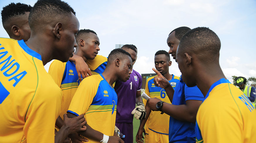 Amavubi U20 head coach Vincent Mashami gives instructions to his players ahead of the second leg against Kenya at Kigali Stadium. Sam Ngendahimana.