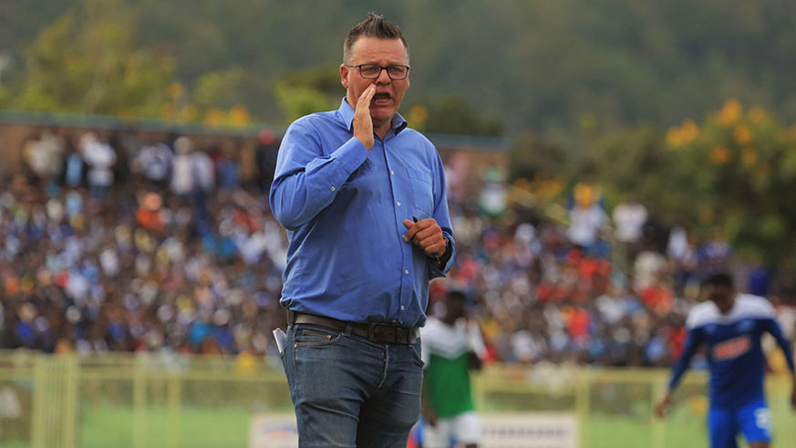 Rayon Sports head coach Ivan Minnaert gives instructions to his players during a past match.  Sam Ngendahimana.