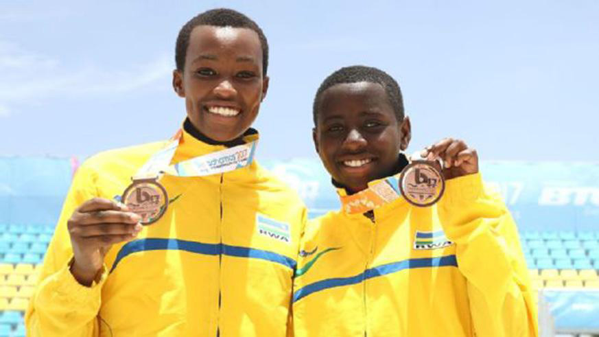 Munezero and Musabyimana pose with their Bronze medals after finishing 3rd at the 2017 Youth Commonwealth Games.(Courtesy)