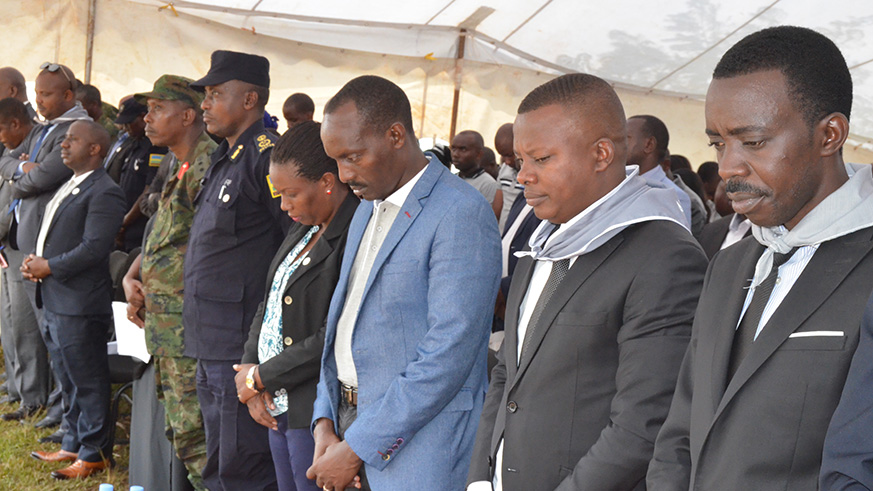 Officials observe a minute of silence in honour of Genocide victims. Jean de Dieu Nsabimana.