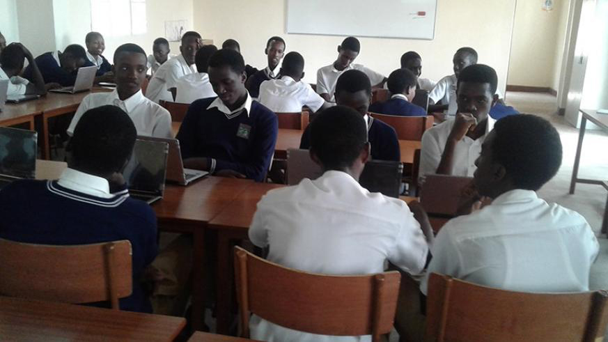 High school students during a computer lesson. File. 