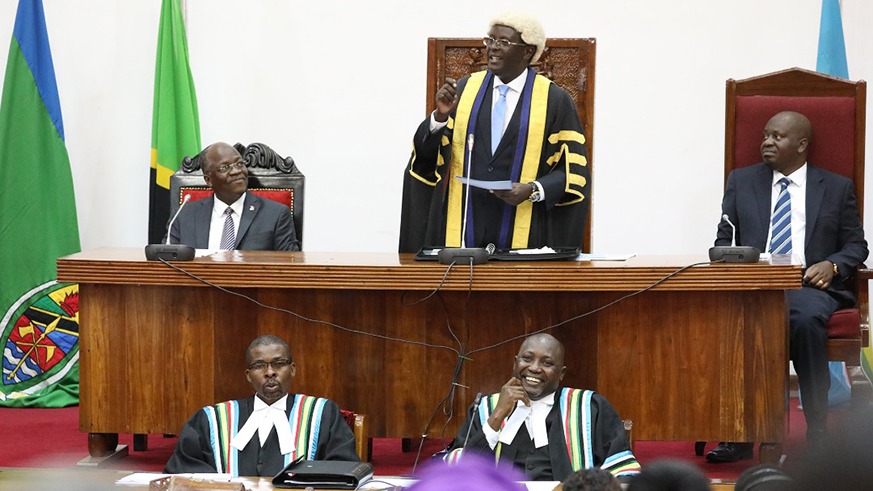 President Magufuli listens as EALA Speaker Martin Ngoga addresses the Assembly. Right is Speaker of Tanzanian Parliament, Job Y. Ndugai. (Courtesy)