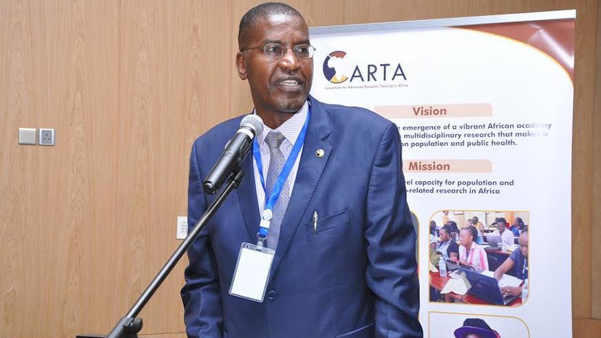 Prof. Peter Ngure the Program Manager for Consortium for Advanced Research Training in Africa speaks at the training of university dons at Kigali Marriott Hotel. (Courtesy)