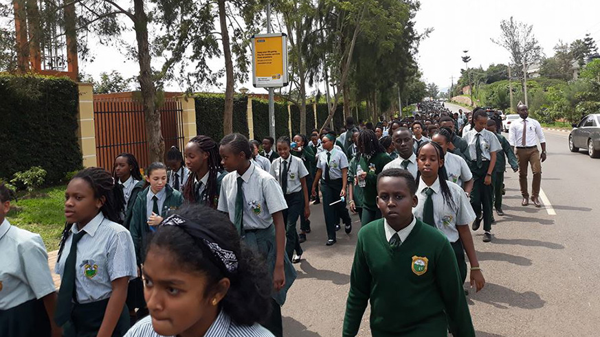 Students and staff of Green Hills Academy during a walk to remember in Kigali. 