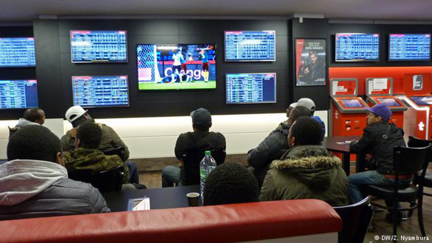 People betting. Betting on major European soccer leagues, as well as local and national teams, has become a multimillion-dollar industry.  Net.