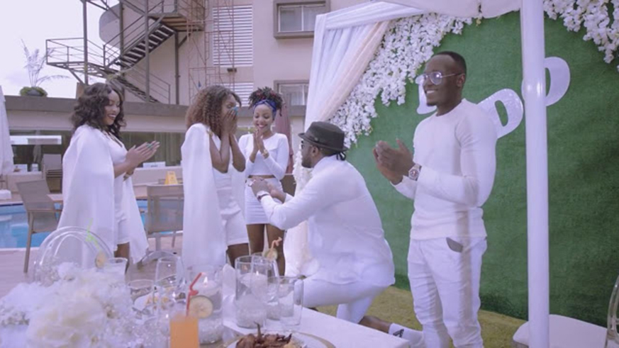 In one of the scenes in the â€˜I Doâ€™ video, Bebe Cool is seen going down on one knee to propose to Nina, one half of Rwandaâ€™s girl duo Charly na Nina. Courtesy.