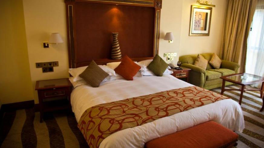 A plush room in a hotel in Kigali.  Left: Airbnb gives travellers options of staying in private homes.  File photos