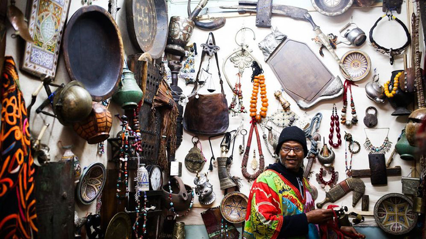A Berber salesman sells Berber artefacts in a shop in Marrakesh in western Morocco. Net photo.