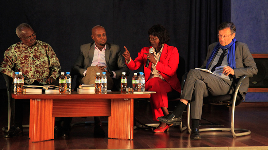 (L-R): Yolande Mukagasana (second from right) with Authors Stephane Audoin-Rouzeau (R) Jean Paul Kimonyo (on her right) and Antoine Mugesera (extreme left) share details of their books with an audience recently.  Sam Ngendahimana