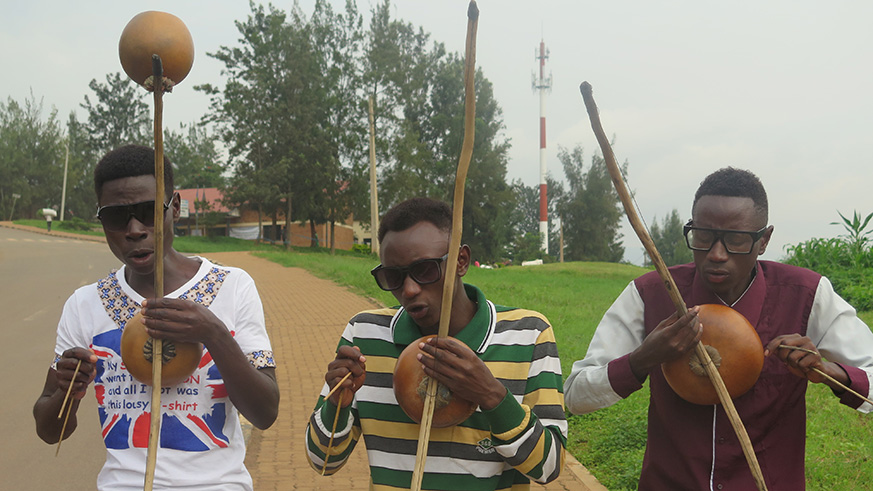 The trio like using the 'Umuduri' to perfom on the streets. Eddie Nsabimana 