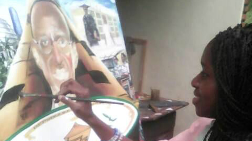 Kanyange paints a portrait of President Kagame as a part of a class group work in 2017. The group made it as a gift to the President. Courtesy.
