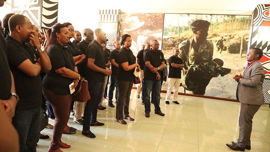 Museum tour guide helps BDF employees during their tour.
