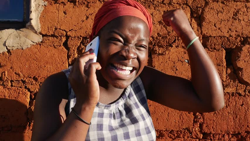 A woman talks on a cellphone Net.