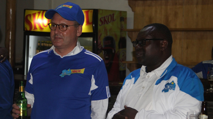 SKOL BREWERY LTD, General Manager Ivan Wulffaert with Rayon Sports secretary general Bernard Kink Itangisha (2). Peter Kamasa