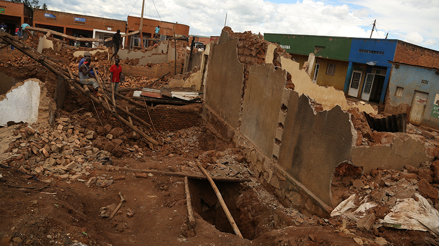 Several houses around the site where thousands of Genocide victims are believed to have been dumped in mass graves during the 1994 Genocide against the Tutsi, in Kabuga I Cell, Rusororo Sector, Gasabo District, have been demolished to pave way for an ongoing exhumation exercise, which will now proceed with the use of excavators. Remains of 209 victims have hitherto been recovered a fortnight after the exercise commenced and officials now say that as many as 5000 people could have been dumped in several mass graves at the site dubbed as CNDu2019. Sam Ngendahimana.