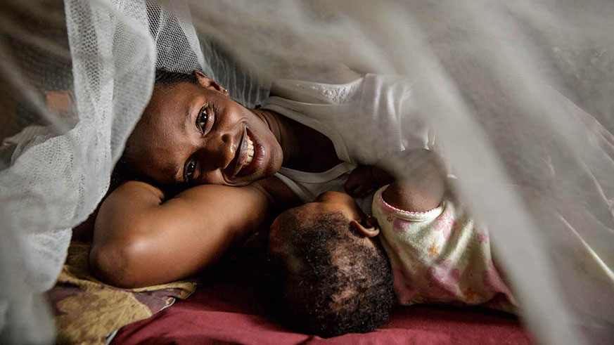 A mother and her child under a mosquito net. RBC has called on authorities across the country to join in the effort to fight malaria by sensitising communities on hygiene and sleeping under bed-nets. Net photo.