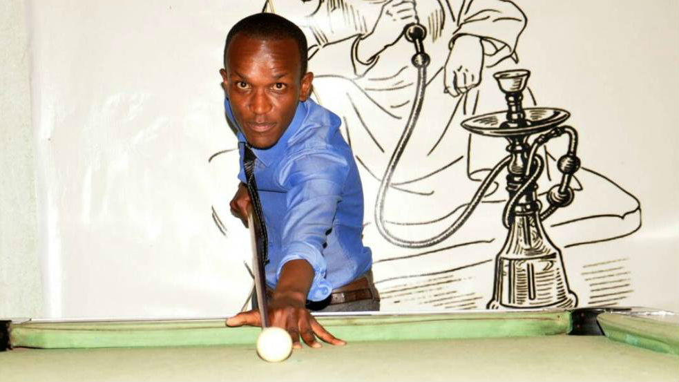 Head of the championship organizers, David Niyonsaba is also a pool table player. (Peter Kamasa)