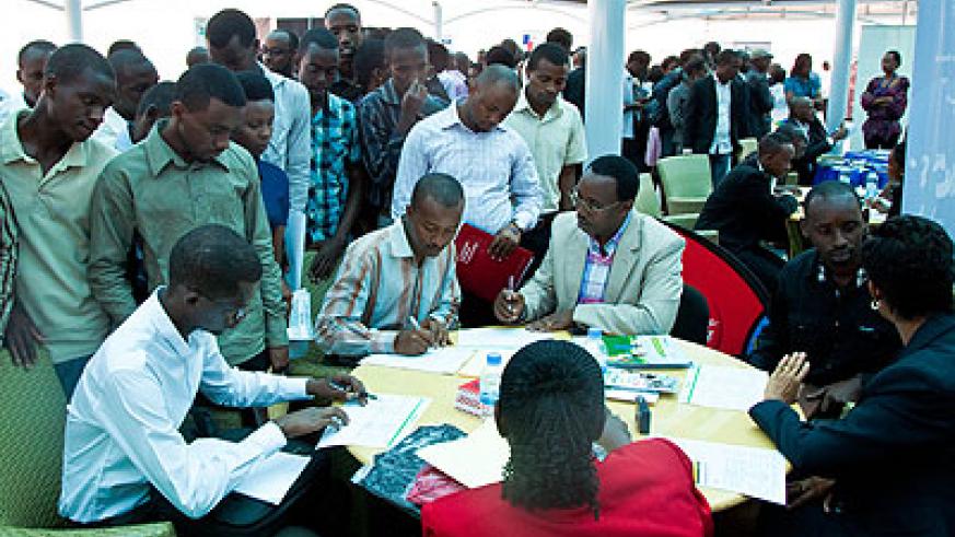 Job seekers meet potential employers at a previous event in Kigali. File.