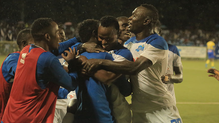 Rayon Sports players celebrate their victory over Costa de Sol at Kigali Stadium last month. Sam Ngendahimana.